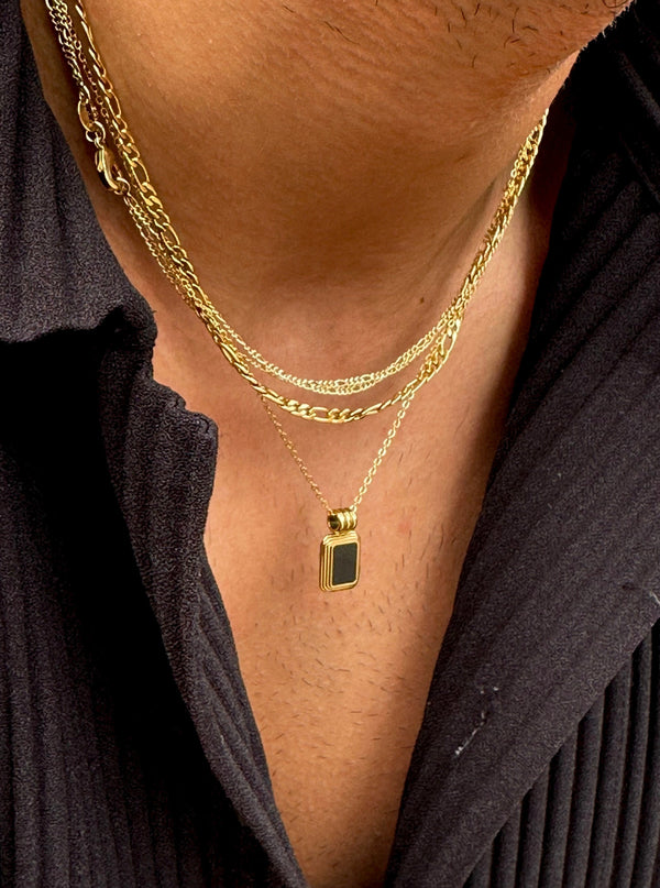 Black onyx pendant with gold Figaro layered chain set